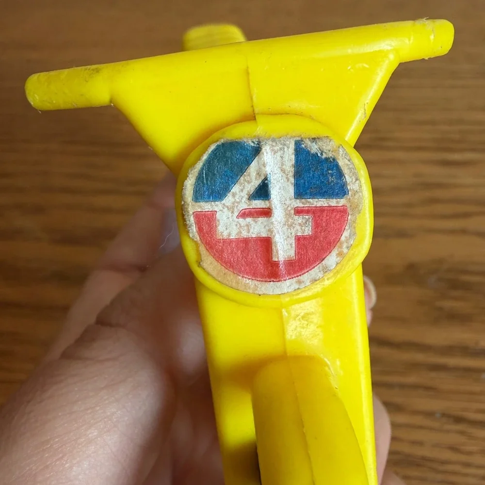 Vintage 1970s Yellow Plastic Toy Motorcycle Dirt Bike Number 4 Racing Retro